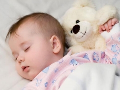 When do children start sleeping all night without waking up?
