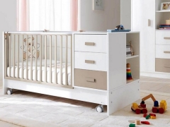 Baby bed with drawers and side