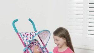 Kereta bayi untuk anak patung Bayi Lahir: apa dan cara untuk memilih?