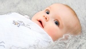 Swaddling isang bagong panganak: ang lahat ng mga kalamangan at kahinaan, hanggang sa kung anong edad na maglagay ng sanggol at kung anong paraan ang pipiliin