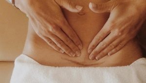 When does menstruation usually begin after cesarean section?