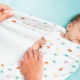 Libre at mahigpit na swaddling: ano ang pagkakaiba at kung ano ang mas mahusay?