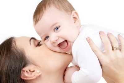 Mom and baby are smiling